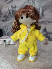 фото Текстильная кукла с нарядами