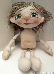 фотография Кукла текстильная с нарисованным лицом